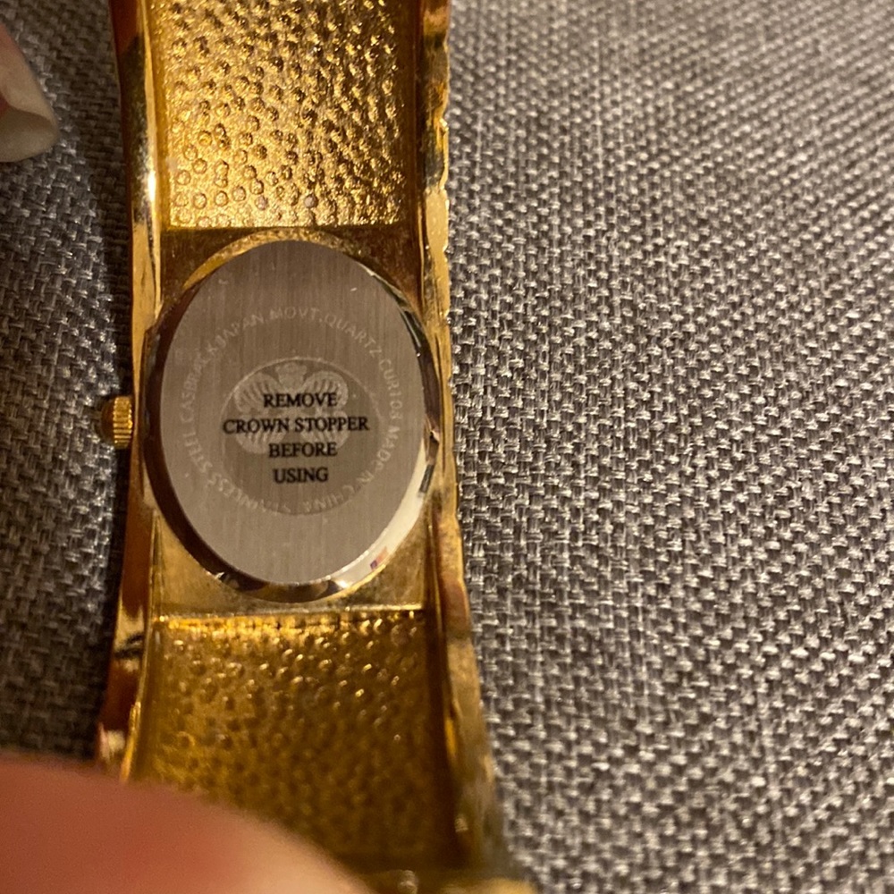gold watch with gems around face - Picture 5 of 6